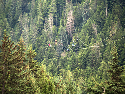 Zip line with riders