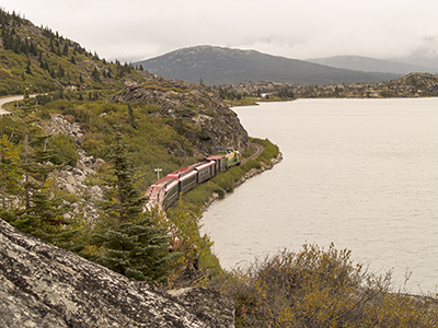White Pass train passing a lake