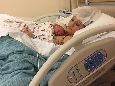 Robin with Cannan on her chest